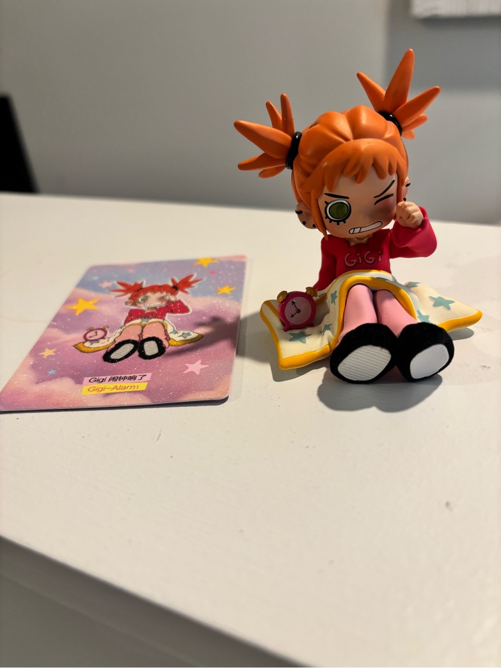 Gigi Alarm Orange Sitting Figurine Kids Collectible Toy